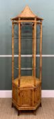 PAGODA TOP BAMBOO DISPLAY STAND, of hexagonal section, three glass shelves, cupboard base fitted two