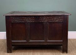 LATE 19TH CENTURY JOINED OAK COFFER, triple panelled top and front, frieze carved with stylised