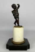19TH CENTURY BRONZE SCULPTURE OF CUPID, half draped, on milled edge base, on marble plinth and slate