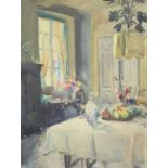 BRITISH SCHOOL watercolour - interior scene with a dressed table and a vase of flowers in the