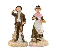PAIR 19TH C. GEBRUDER HEUBACH COLOURED BISQUE FIGURES, of a gardener with broom and companion flower