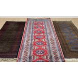 THREE ORIENTAL RUNNERS, two with signed arabic cartouches, largest 390 x 82cms (3) Provenance: