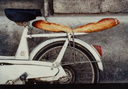 ‡ TIM PAGE (1944-2022) photograph - 'Auxerre', 1979, bicycle and baguette, signed and titled, 29 x