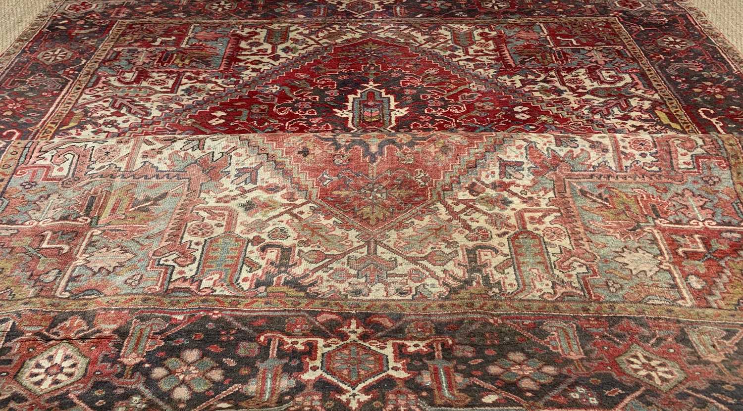 HERIZ CARPET, red lozenge serrated field and ivory/teal spandrels, broad dark border, 412 x 289cms - Image 2 of 6