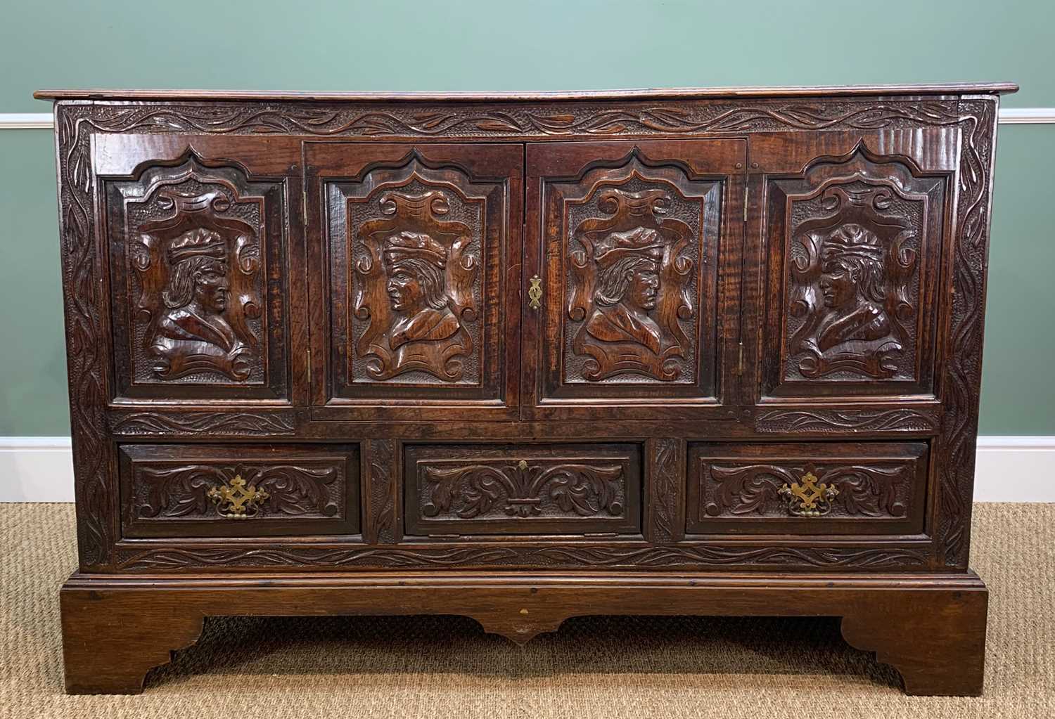 ANTIQUE JOINED OAK MULE CHEST, later carved in the Romanesque-style and converted to cupboard with