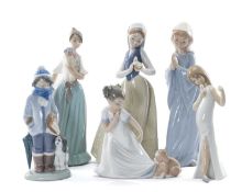 SIX NAO & LLADRO FIGURES including, Winter 5220 21cms, Girl with Puppy 1434 17cms, Praying Girl