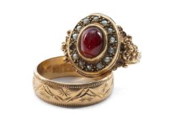 TWO 9CT GOLD RINGS, comprising cabochon garnet and seed pearl ring and an engraved band, 9.2gms