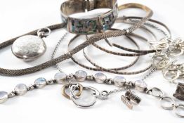 SILVER JEWELLERY comprising four silver bangles, three silver bracelets, two silver necklaces,