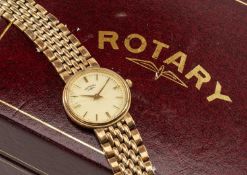 9CT GOLD LADY'S ROTARY WRISTWATCH, baton hour markers, with integrated 9ct gold brick link bracelet,
