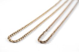 TWO 9CT GOLD CHAINS, comprising one flat curb link chain, 58.5cms long, and a spiral link chain,