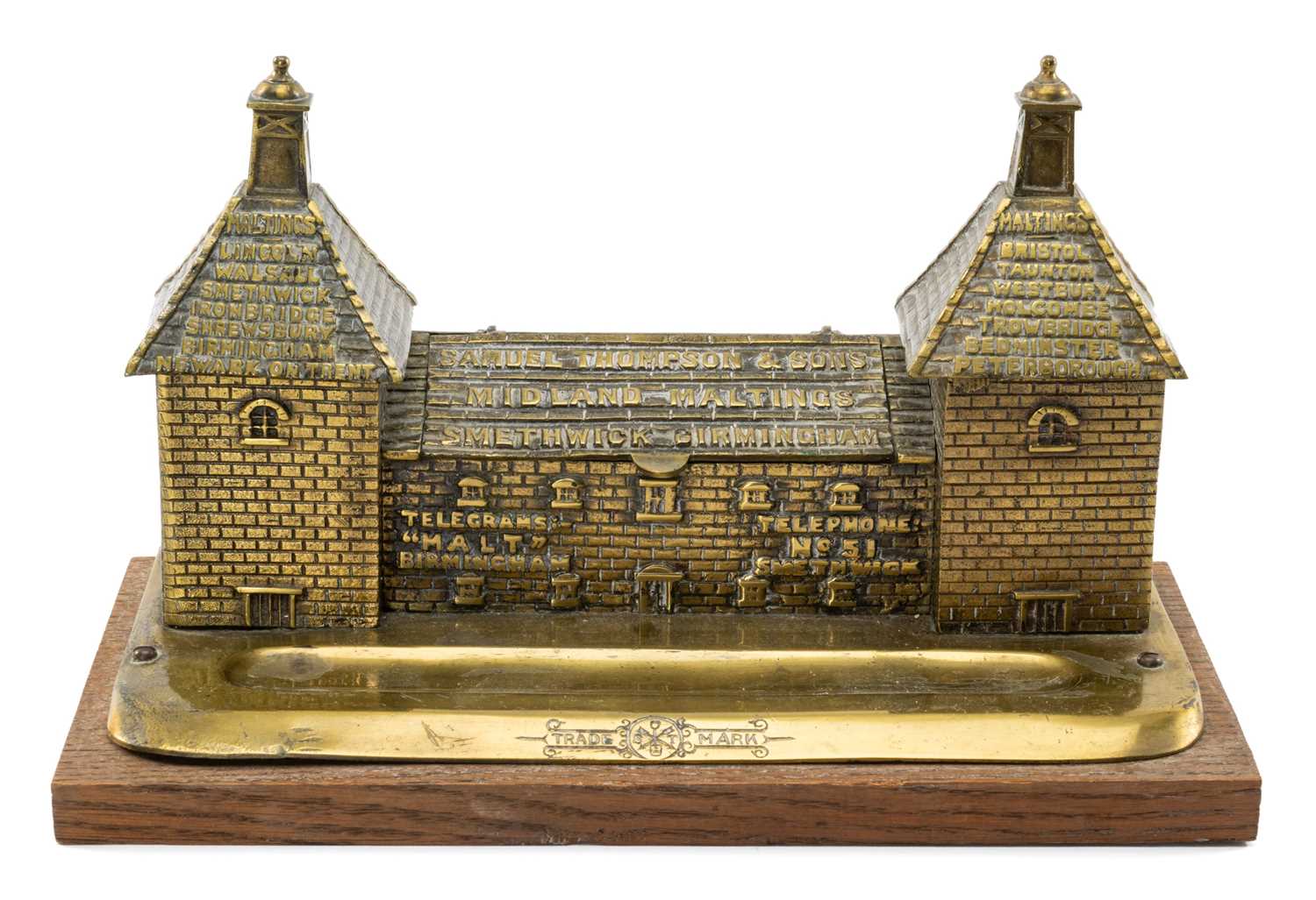 CAST BRASS SAMUEL THOMPSON & SONS DESK INKSTAND, modelled as a Maltings building, marked 'Midland