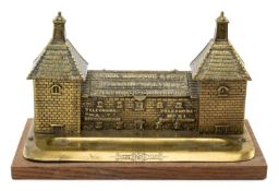 CAST BRASS SAMUEL THOMPSON & SONS DESK INKSTAND, modelled as a Maltings building, marked 'Midland