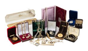 ASSORTED COSTUME JEWELLERY including silver and silver gilt coin pendants on chains, bangles, plated