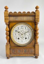 EARLY 20TH CENTURY WALNUT 8-DAY MANTEL CLOCK, the William Morris-style enamelled dial within cast