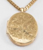 9CT GOLD OVAL LOCKET, scroll engraved on 9ct gold flat curb link chain, 75cms long, 36.5gms, in