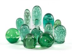ASSORTED VICTORIAN GREEN GLASS DUMPS, one still attached to pontil (12) Provenance: collection of