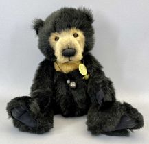 CHARLIE BEARS CB194202 SETH, designed by Isabelle Lee, wearing necklace and bell, with cardboard