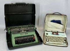 TWO CASED VINTAGE TYPEWRITERS, including an Olympia in light blue and a more modern Silver Reed