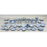 COLLECTION OF WEDGWOOD BLUE & WHITE JASPERWARE ITEMS, mainly pin trays and lidded boxes, approx.