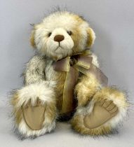 CHARLIE BEARS CB604799 JACKIE, designed by Isabelle Lee, wearing ribbon with heart, with cardboard