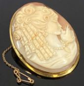 18CT GOLD FRAMED SHELL CARVED CAMEO BROOCH with head and shoulders depiction of a young woman,