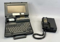 VINTAGE VODAFONE TYPE EF-6152EB CLASS 2 PORTABLE TELEPHONE, serial no. 41872, and a Sharp PC 4521