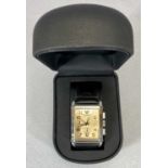 GENTS EMPORIO ARMANI QUARTZ RECTANGULAR CHROME CASE WRISTWATCH WITH LEATHER STRAP, copper tone dial,