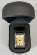 GENTS EMPORIO ARMANI QUARTZ RECTANGULAR CHROME CASE WRISTWATCH WITH LEATHER STRAP, copper tone dial,