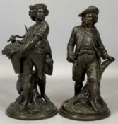 TWO SPELTER FIGURINES, one depicting a jacketed gentleman with feathered hat, 25cms H, the other