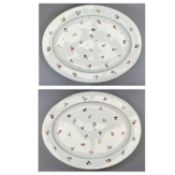 PAIR OF LARGE OVAL PORCELAIN MEAT PLATES, late 19th Century, hand painted with floral sprays, 55 x