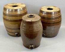 TWO VICTORIAN STONEWARE SPIRIT BARRELS, numbers 3 and 4, 37cms H (the tallest), and a Victorian salt