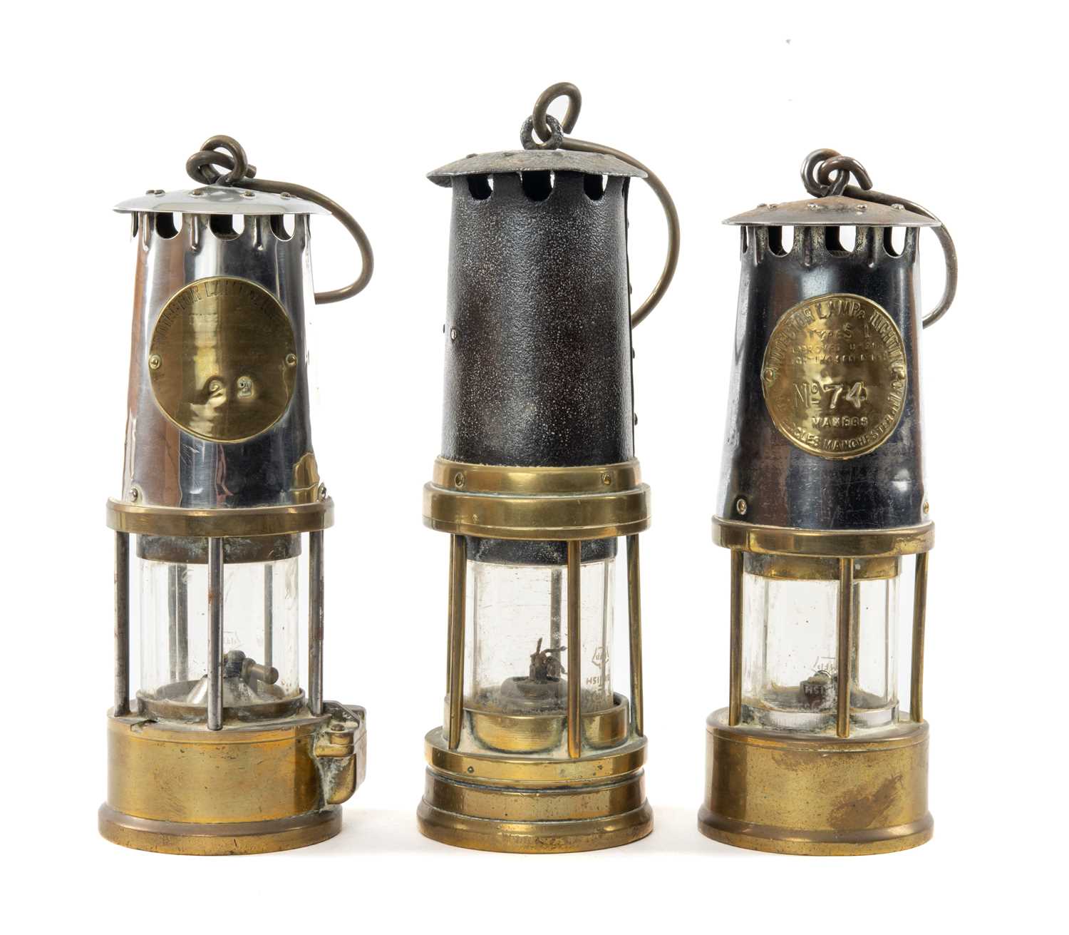THREE MINER'S SAFETY LAMPS, including 2x Type S1 lamps by The Protector Lamp & Lighting Co. Ltd.