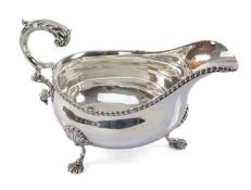 VICTORIAN SILVER SAUCE BOAT, James Garrard, London 1893, with gadrooned rim, fling scroll handles