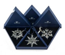 THREE SWAROVSKI CHRISTMAS ORNAMENTS, boxed, 2007, 2009, 2010 (3) Provenance: private collection