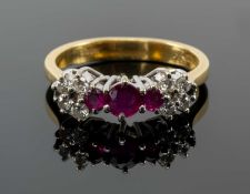 18CT GOLD DIAMOND & RUBY CLUSTER RING, ring size M 1/2, 4.2gms Provenance: private collection