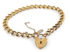 9CT GOLD CURB LINK BRACELET, heart padlock, 15.0gms  Provenance: private collection Denbighshire