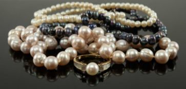 THREE SINGLE STRAND CULTURED PEARL NECKLACES, comprising strand of black pearls 4mm/5mm diam, a