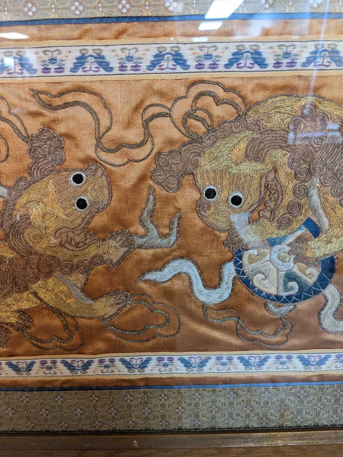 CHINESE EMBROIDERED 'DOG OF FO' SILK PANEL, c.1900, decorated in gold thread with the mythical - Image 3 of 4