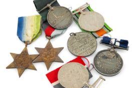 ASSORTED MEDALS comprising George VI Distinguished Service Medal engraved to J. R. Key A. B. H. M.
