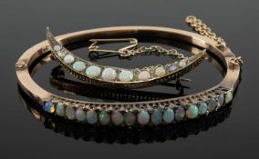 OPAL BANGLE & CRESCENT BROOCH, the hinged bangle set with 17 oval opals, unmarked yellow gold, 9gms;