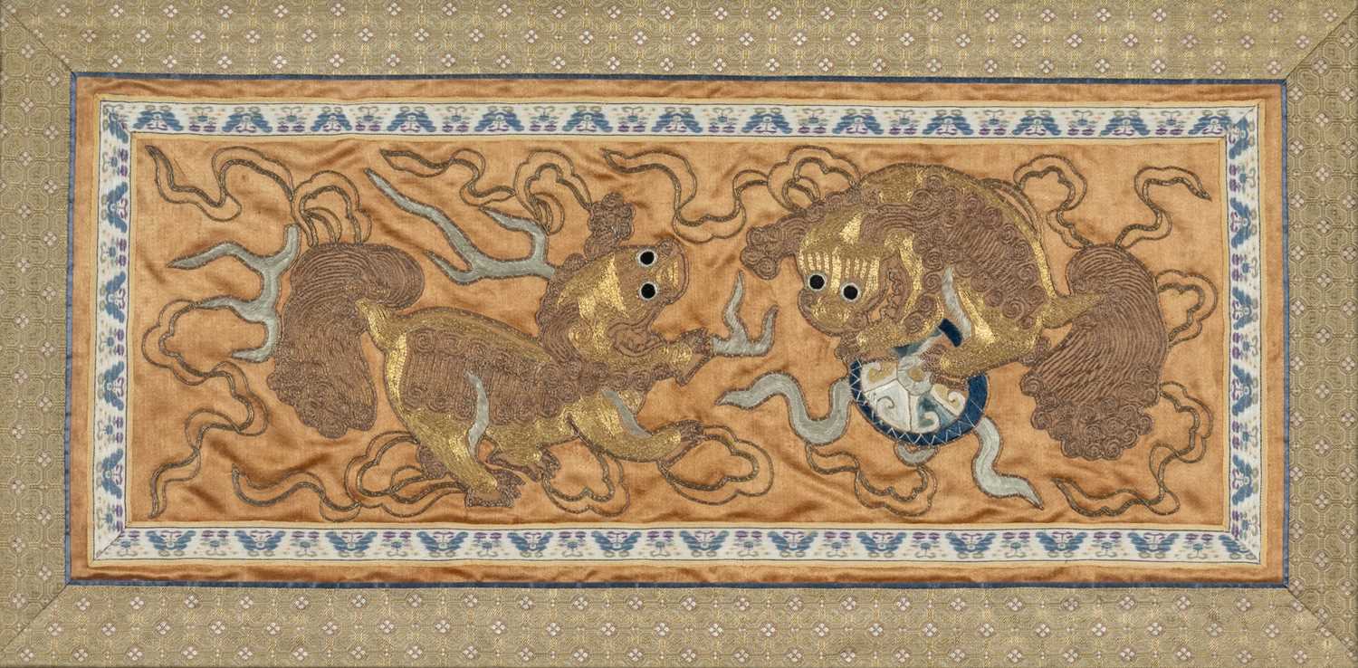 CHINESE EMBROIDERED 'DOG OF FO' SILK PANEL, c.1900, decorated in gold thread with the mythical