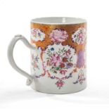 LARGE CHINESE 'MANDARIN' PATTERN FAMILLE ROSE TANKARD, Qianlong, decorated with basket of flowers,