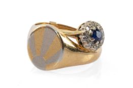 TWO GOLD RINGS comprising 18ct gold sunburst ring and an 18ct gold sapphire and diamond chip cluster