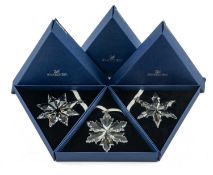 THREE SWAROVSKI CHRISTMAS ORNAMENTS, boxed, 2013, 2014, 2015 (3) Provenance: private collection