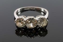 THREE-STONE DIAMOND RING, shank stamped '18CT PLAT', tot diamond wt. approx. 1.75ct, gross wt