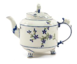 18TH C. LUDWIGSBURG PORCELAIN TEAPOT & COVER, painted with blue cornflowers, cover with lion finial,