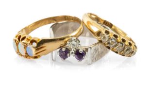 THREE GOLD RINGS comprising 18ct gold five stone diamond ring, 18ct gold three stone opal ring and