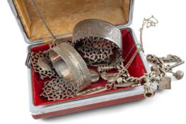 ASSORTED SILVER JEWELLERY comprising two silver pierced nurses buckles, silver bangle and similar
