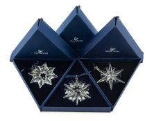 THREE SWAROVSKI CHRISTMAS ORNAMENTS, boxed, 2002, 2003, 2005 (3) Provenance: private collection