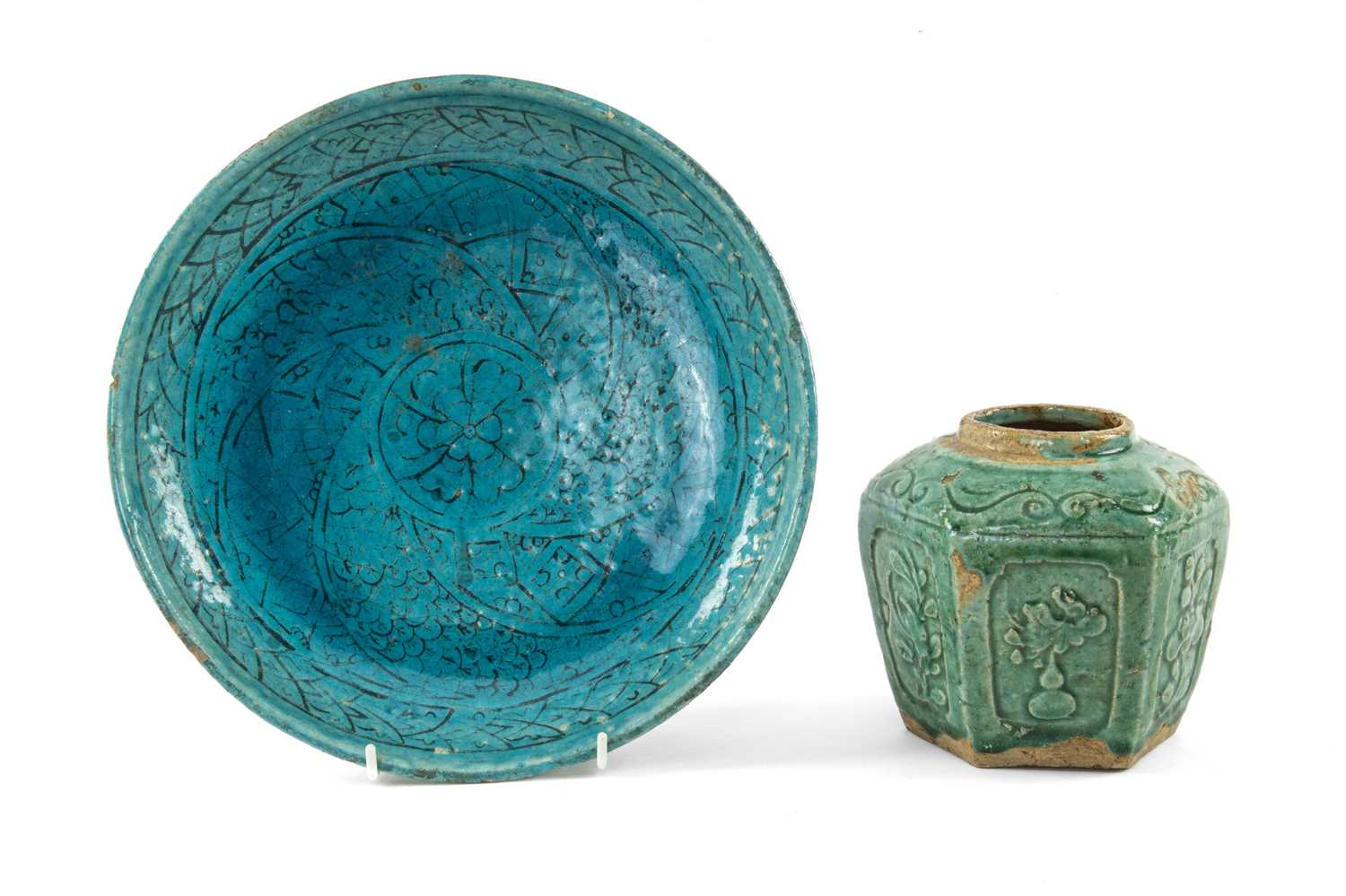 SULTANABAD WARE POTTERY DISH, of shallow rounded form on a short foot, turquoise glaze with stylised